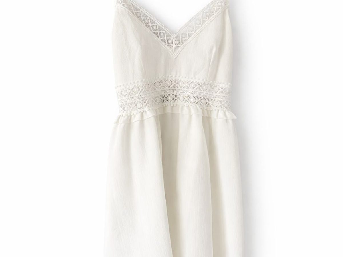 Vestigo blanco corto