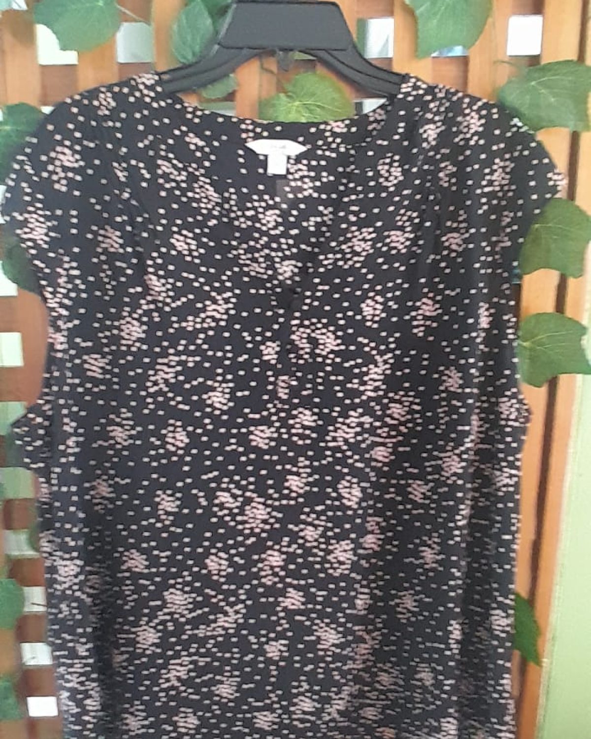 BLUSA NEGRA Y CIRCULOS ZAPOTE