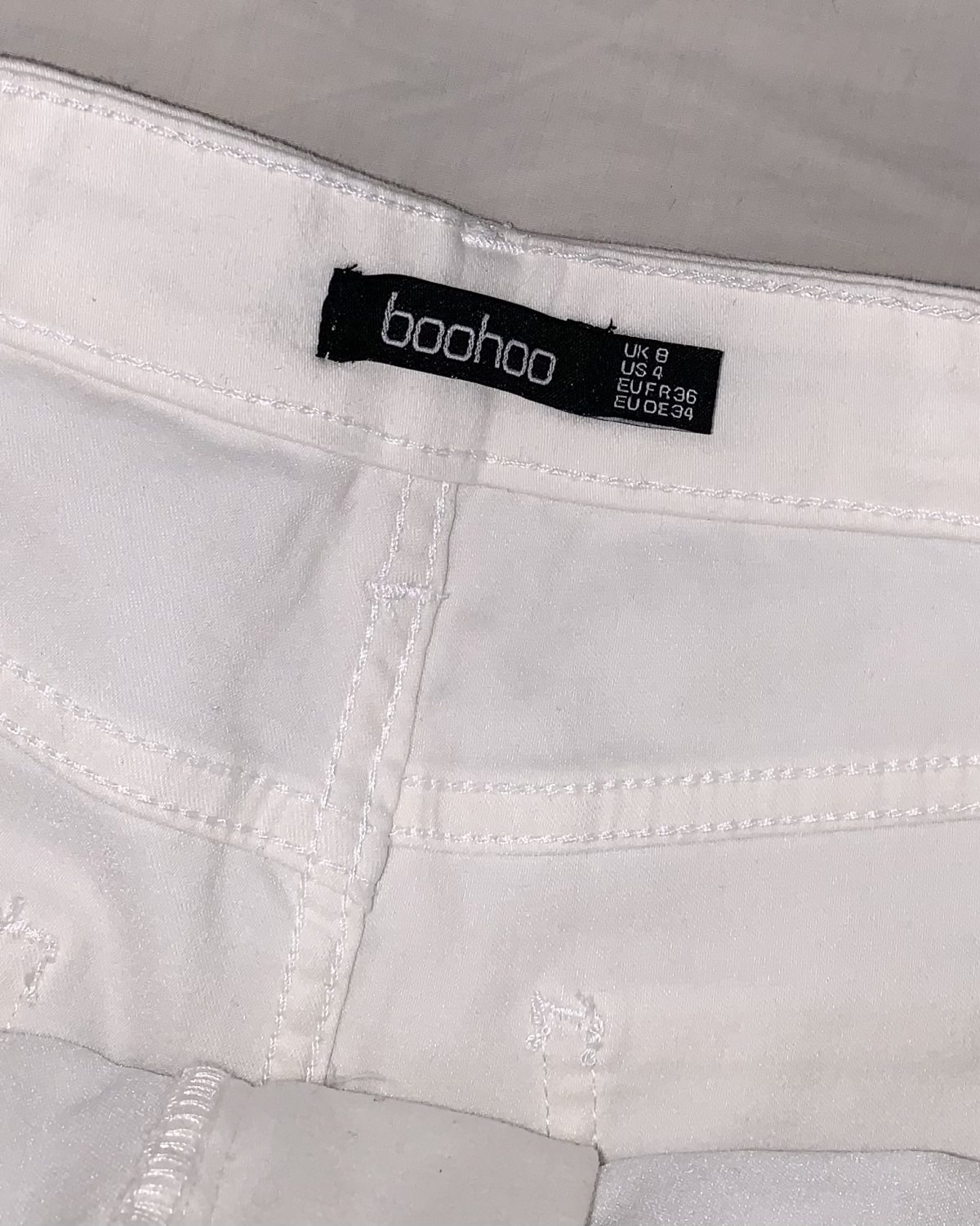 Pantalón blanco Size S, extiende