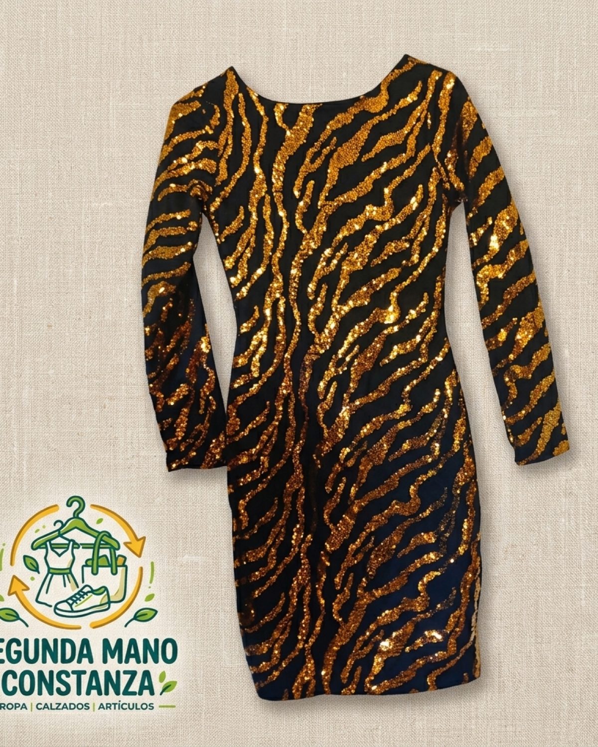 Vestido ceñido negro, S/M, a la rodilla, con bordado de lentejuelas doradas, simulando animal print de cebra.