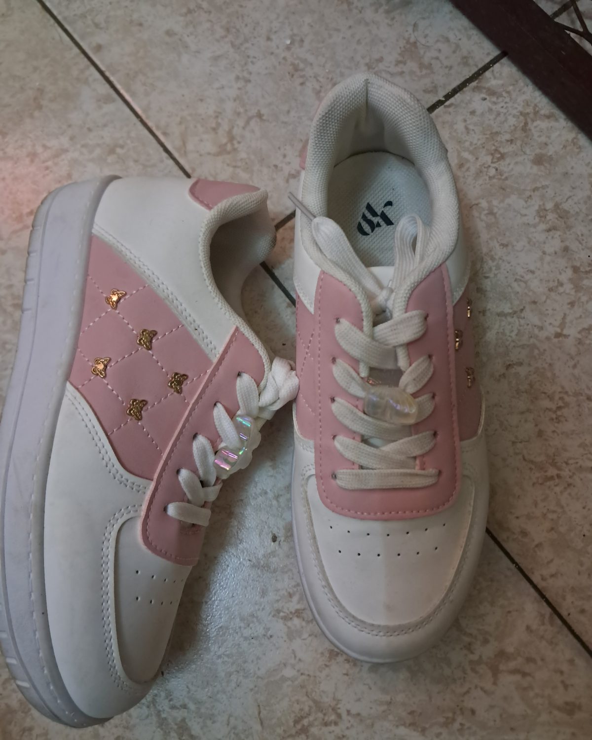 Tenis para niña Blanco en buen estado con detalles en rosa