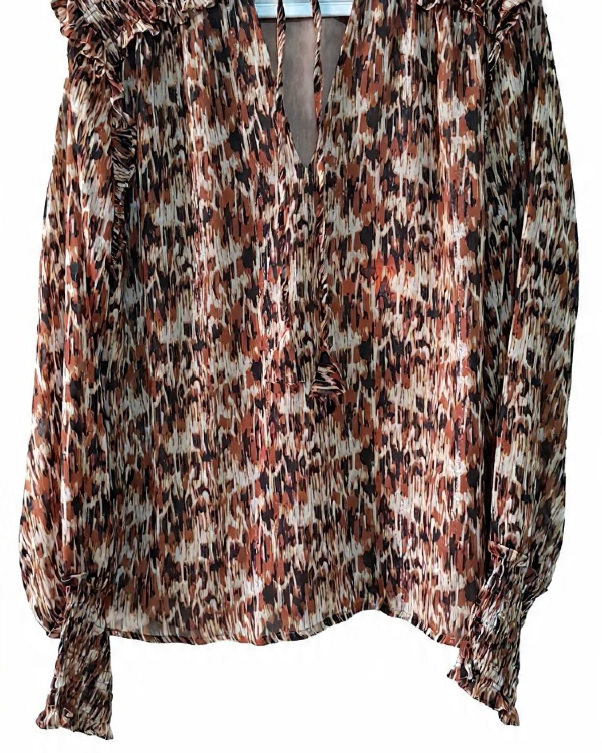 Blusa fluida con estampado abstracto. Color terracota. 🤎 Detalles plizados.