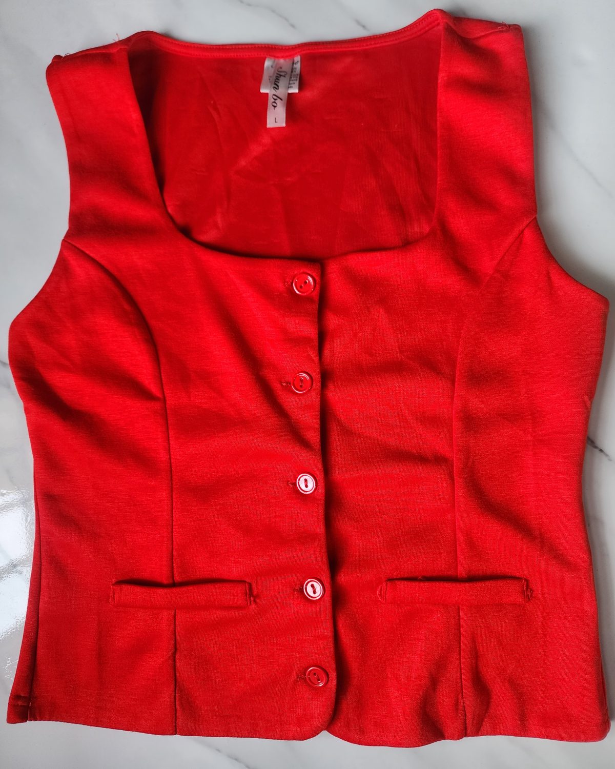 Blusa tipo camisa sin mangas